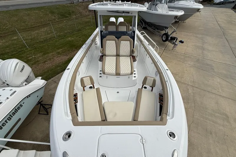 Slide: The Image of 2026 Everglades 315 Center Console boat with luxurious seating and modern design. - 27