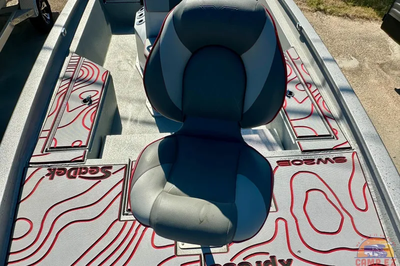 Slide: The Image of 2024 SeaArk SW20B BAY boat interior with custom seating and SeaDek flooring. - 11