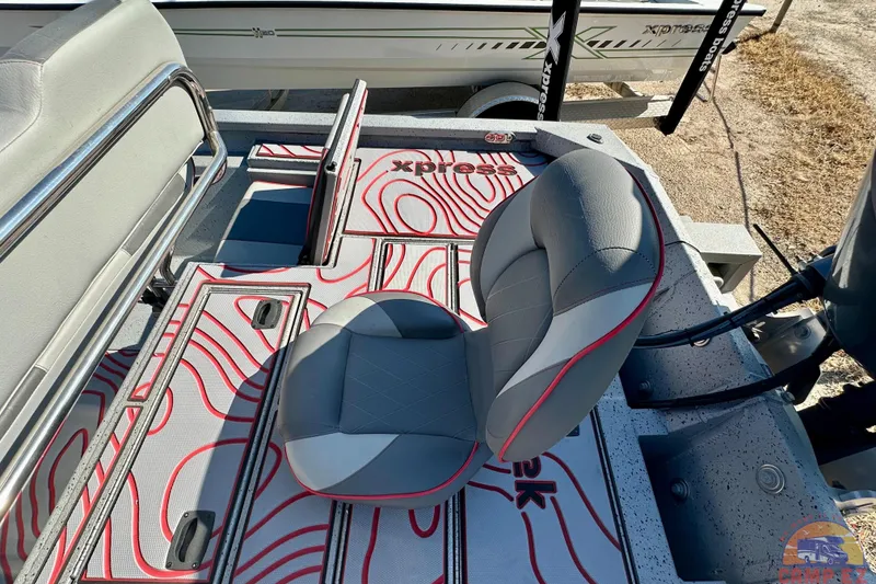 Slide: The Image of 2024 SeaArk SW20B BAY boat interior with stylish seating and patterned flooring. - 23