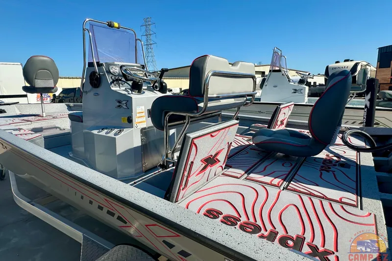 Slide: The Image of 2024 SeaArk SW20B BAY boat interior with modern seating and control console. - 24