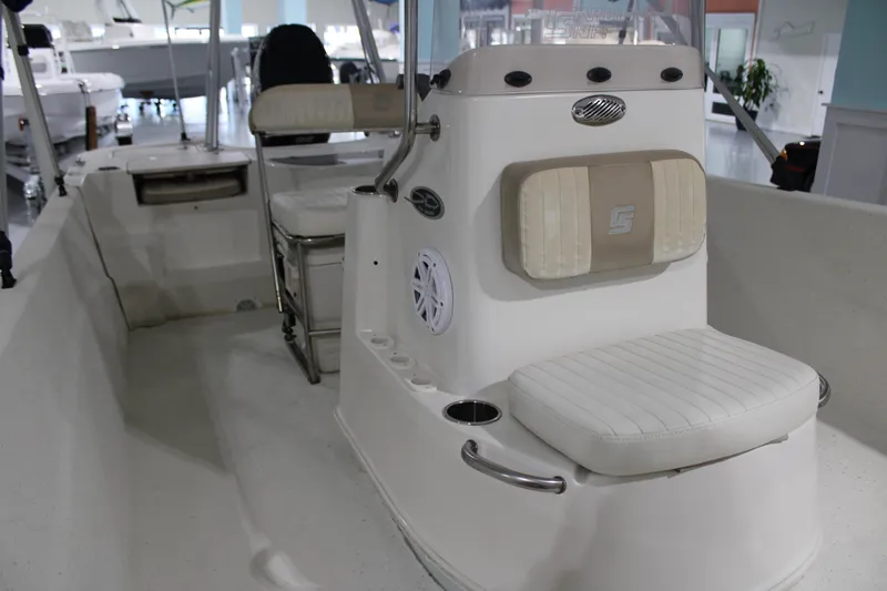 Slide: The Image of 2014 Carolina Skiff 198 DLV boat interior with seating and console. - 10