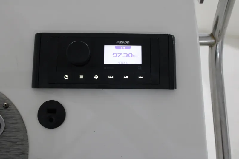 Slide: The Image of Fusion radio display on 2014 Carolina Skiff 198 DLV boat console. - 18