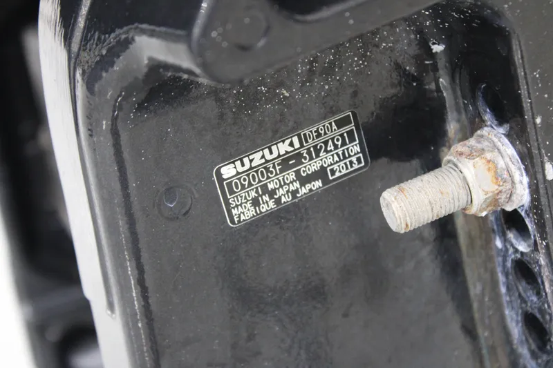 Slide: The Image of Close-up of Suzuki DF90A engine label on a 2014 Carolina Skiff 198 DLV boat. - 20