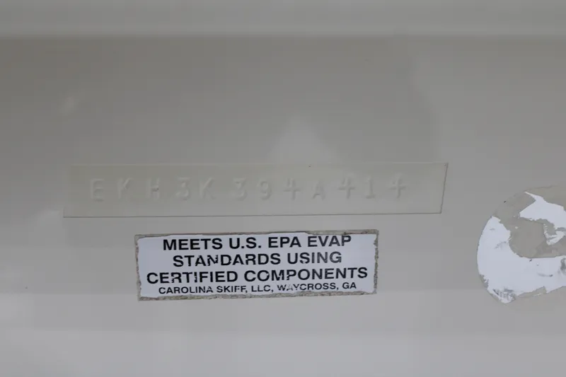 Slide: The Image of 2014 Carolina Skiff 198 DLV compliance label with U.S. EPA standards certification. - 21