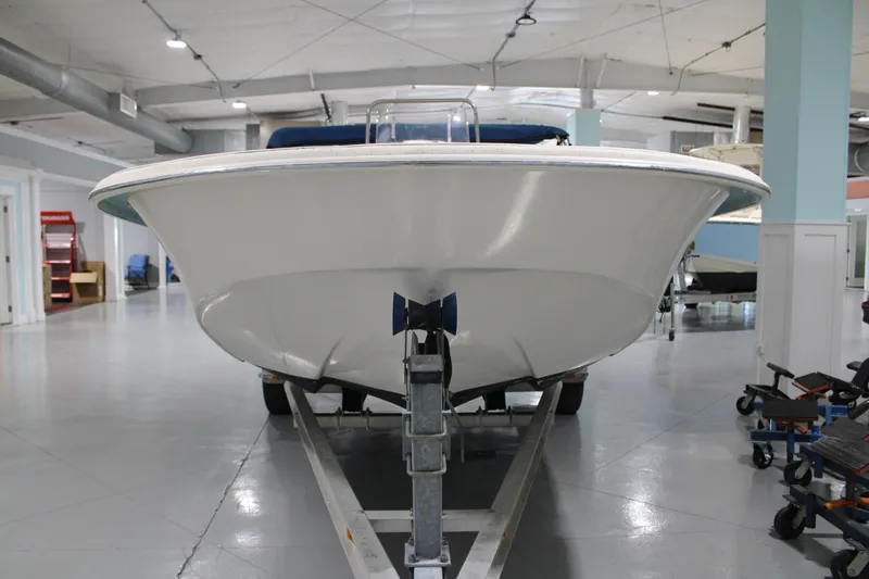 Slide: The Image of 2014 Carolina Skiff 198 DLV boat on trailer in indoor showroom. - 6