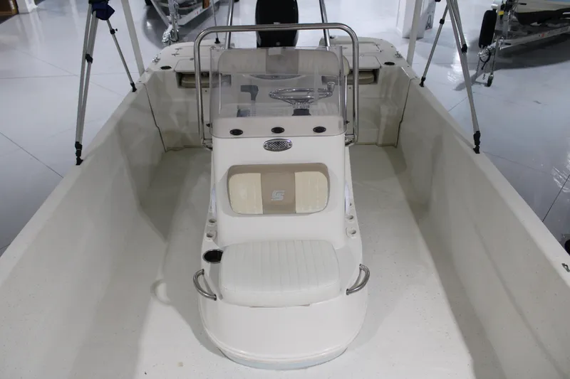 Slide: The Image of 2014 Carolina Skiff 198 DLV boat interior with console and seating. - 8