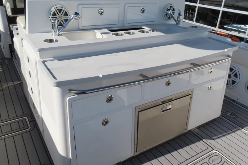 Slide: The Image of Luxurious 2018 HCB 53 yacht kitchen with sink, storage, and modern design. - 15