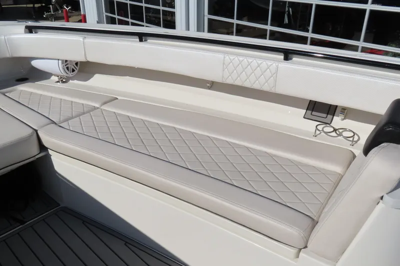 Slide: The Image of Luxurious seating on 2018 HCB 53 boat with diamond-stitched upholstery. - 36