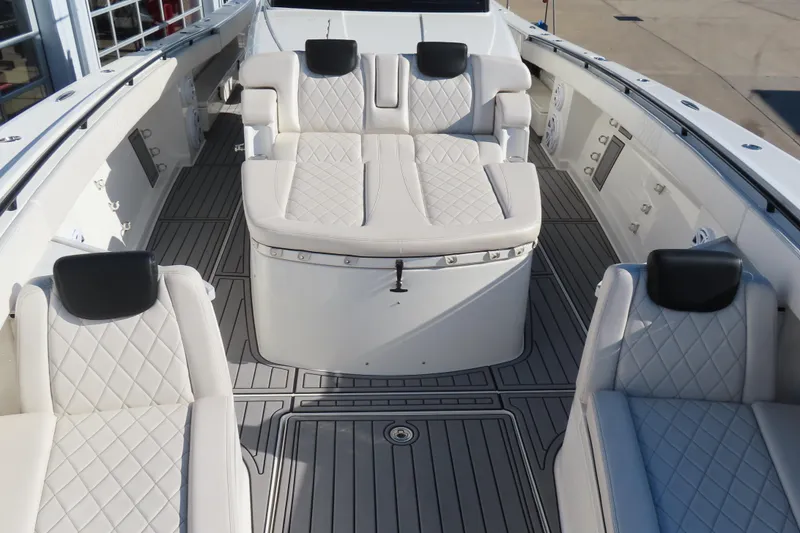 Slide: The Image of Luxurious 2018 HCB 53 boat interior with plush white seating and modern design. - 40