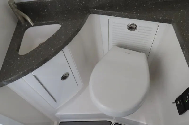 Slide: The Image of Compact bathroom in 2018 HCB 53 boat with sink and toilet. - 50