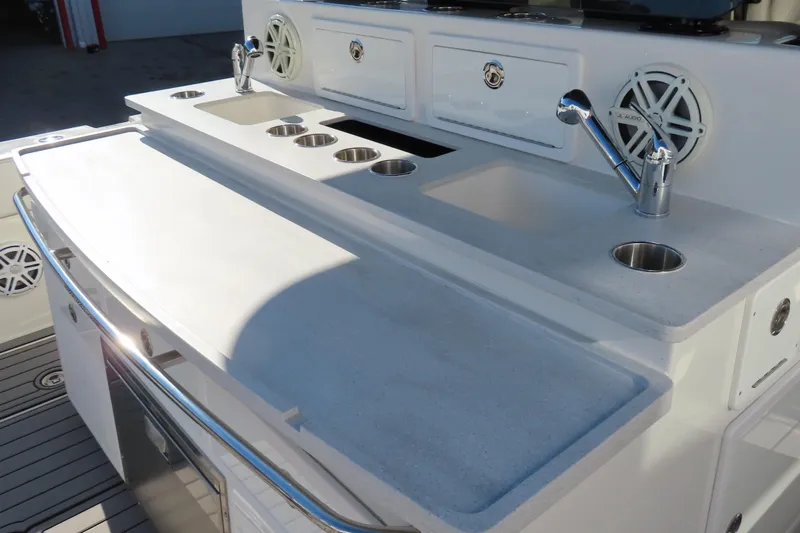 Slide: The Image of Luxury HCB 53 yacht kitchen area with sinks and cup holders, 2018 model. - 55
