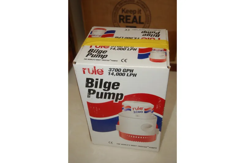 Slide: The Image of Box of Rule 3700 GPH bilge pump, 2006 Custom Sprague model. - 106