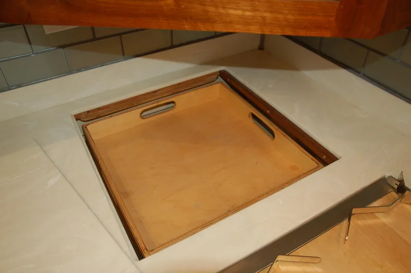 Slide: The Image of Custom 2006 Sprague wooden tray inlaid in a kitchen countertop. - 118