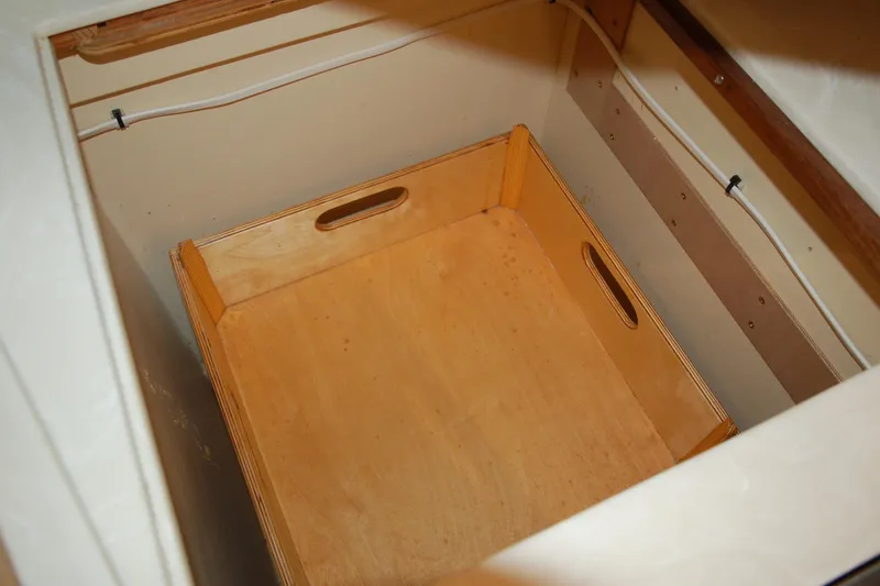 Slide: The Image of Wooden storage box inside a Custom Sprague 2006 model compartment. - 120