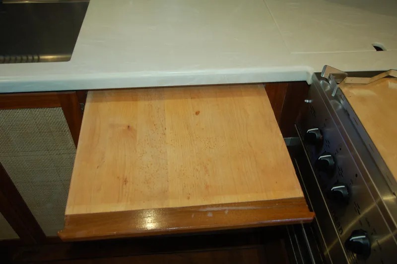 Slide: The Image of Pull-out wooden cutting board in a kitchen with a Custom Sprague design, 2006. - 122