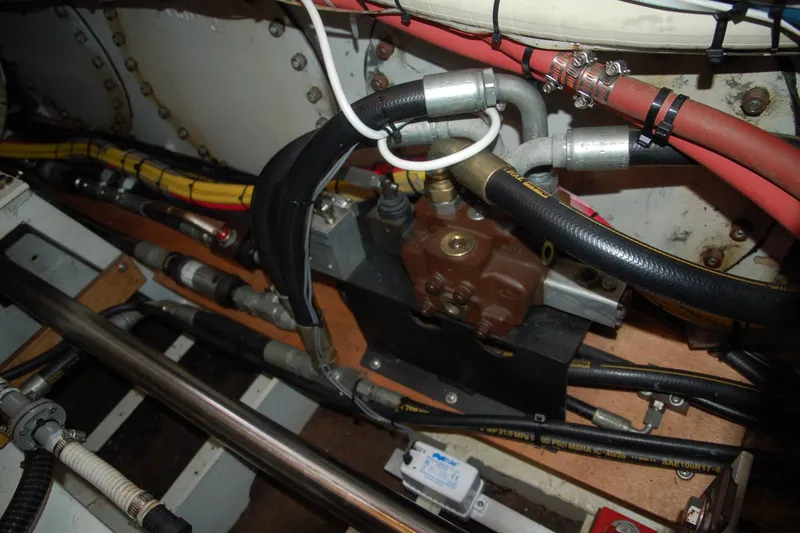 Slide: The Image of Engine compartment with custom Sprague model, featuring various hoses and components, 2006. - 139