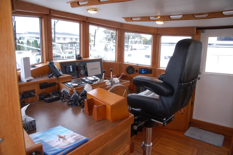 Slide: The Image of Pilothouse interior of 2006 Custom Sprague boat with navigation equipment and captain's chair. - 14