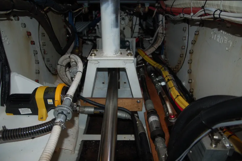 Slide: The Image of Engine room of a 2006 Custom Sprague, featuring cables and mechanical components. - 140