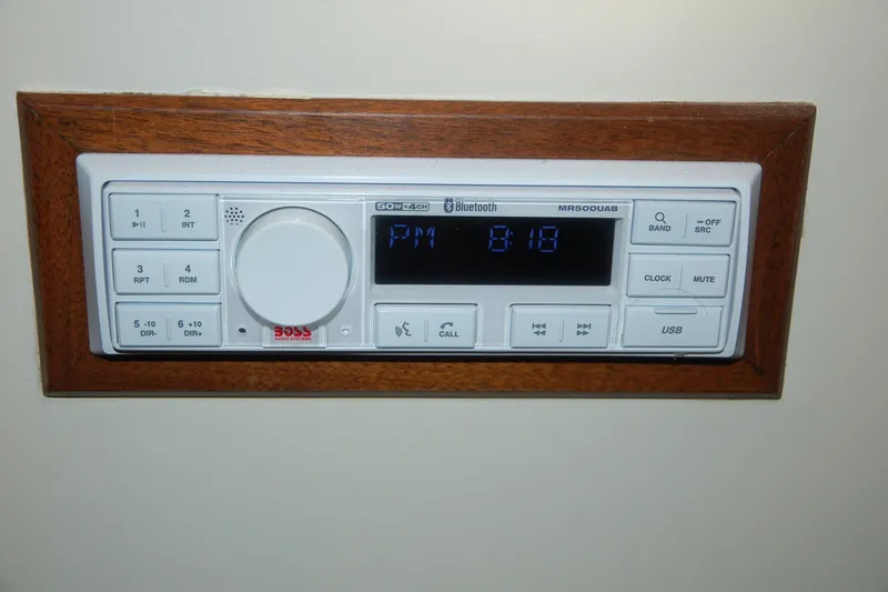 Slide: The Image of Custom Sprague 2006 audio system with Bluetooth and USB, mounted in wooden frame. - 149