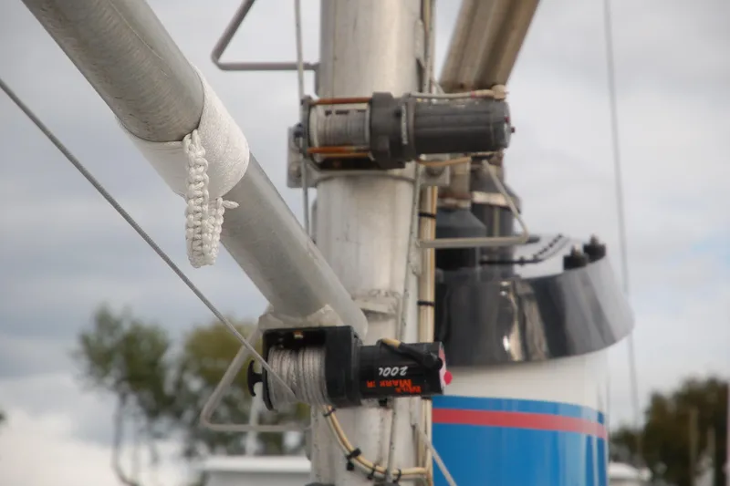 Slide: The Image of Close-up of a 2006 Custom Sprague boat mast with rigging and winches. - 156