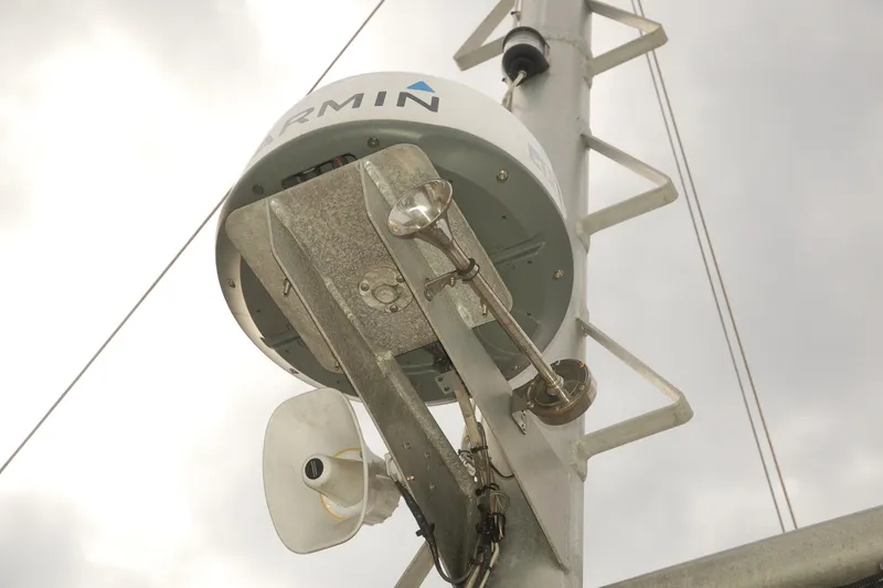 Slide: The Image of Antenna and speaker on Custom Sprague 2006 mast against cloudy sky. - 160