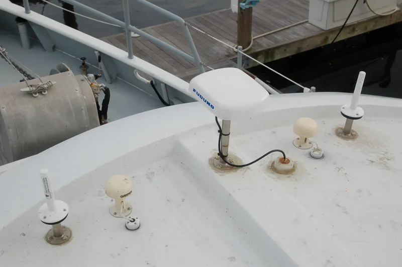 Slide: The Image of Boat deck with antennas and equipment, Custom Sprague model, 2006, docked at marina. - 164