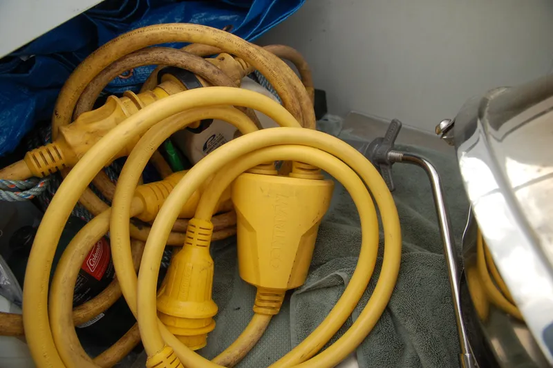 Slide: The Image of Yellow power cords coiled in storage, Custom Sprague 2006 model. - 168