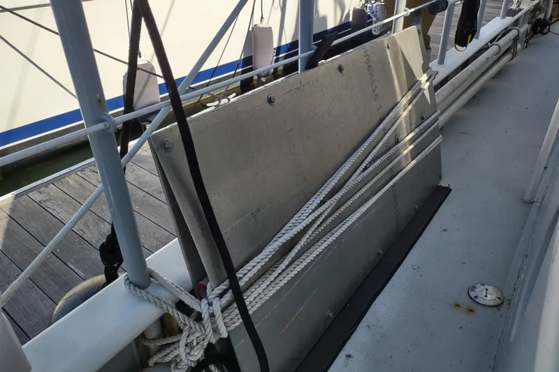 Slide: The Image of Rope and metal panel on Custom Sprague boat deck, 2006 model. - 177