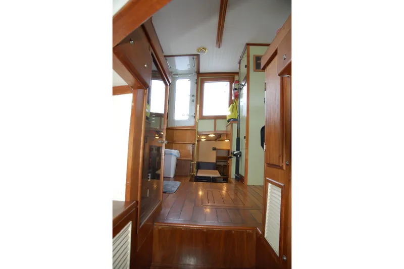 Slide: The Image of Interior of 2006 Custom Sprague boat with wooden flooring and cabinetry. - 34