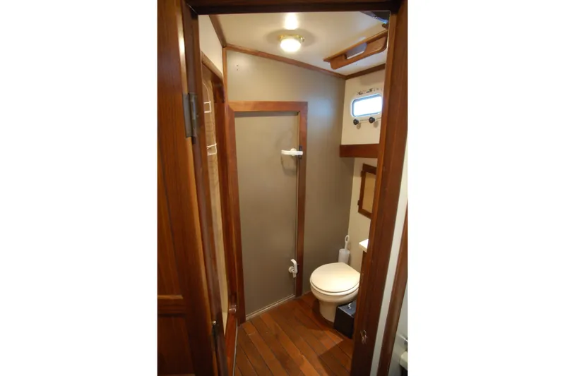 Slide: The Image of Compact wooden bathroom interior in a 2006 Custom Sprague model. - 35