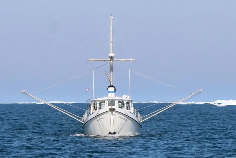 Slide: The Image of Front view of 2006 Custom Sprague boat navigating icy waters. - 4