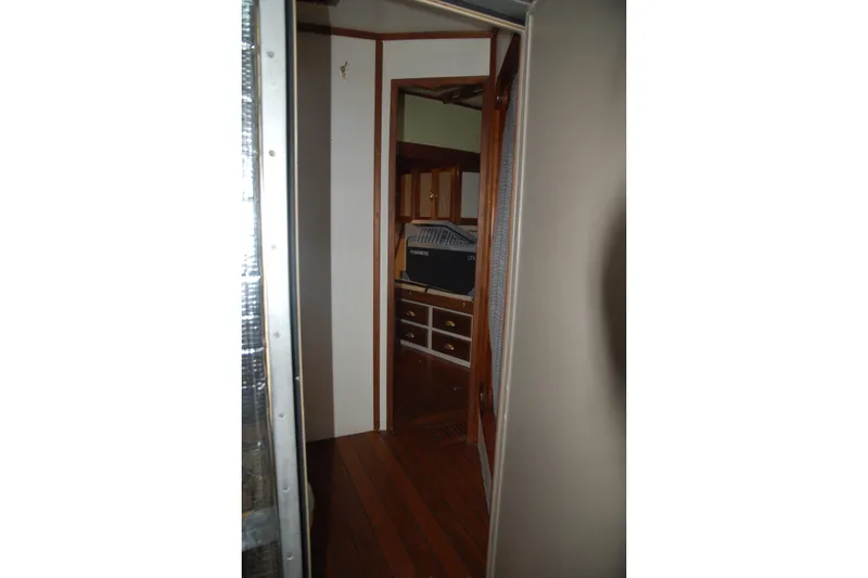 Slide: The Image of Interior view of a 2006 Custom Sprague with wooden flooring and cabinetry. - 46