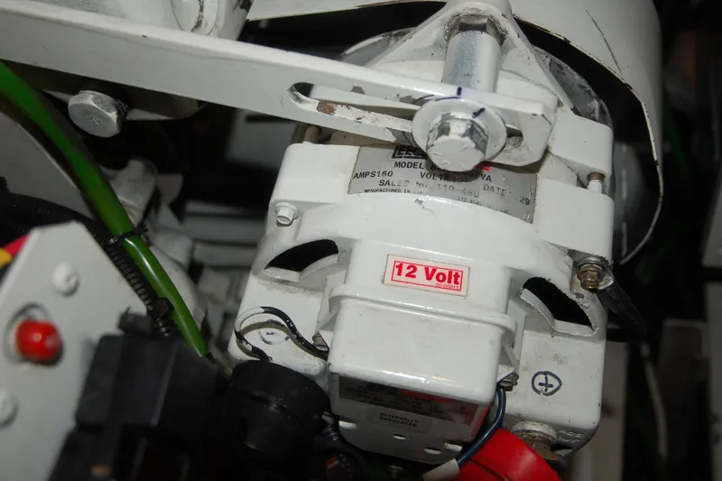 Slide: The Image of Close-up of a 2006 Custom Sprague electrical component labeled "12 Volt." - 67