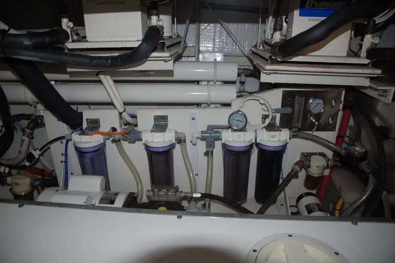 Slide: The Image of Engine room of a 2006 Custom Sprague with filtration system and gauges. - 73