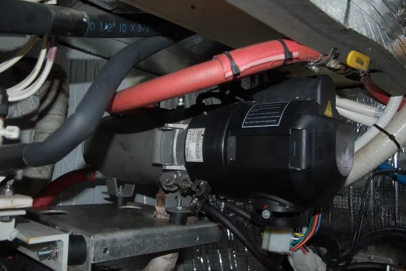 Slide: The Image of Custom 2006 Sprague model with complex wiring and tubing in an industrial setting. - 75