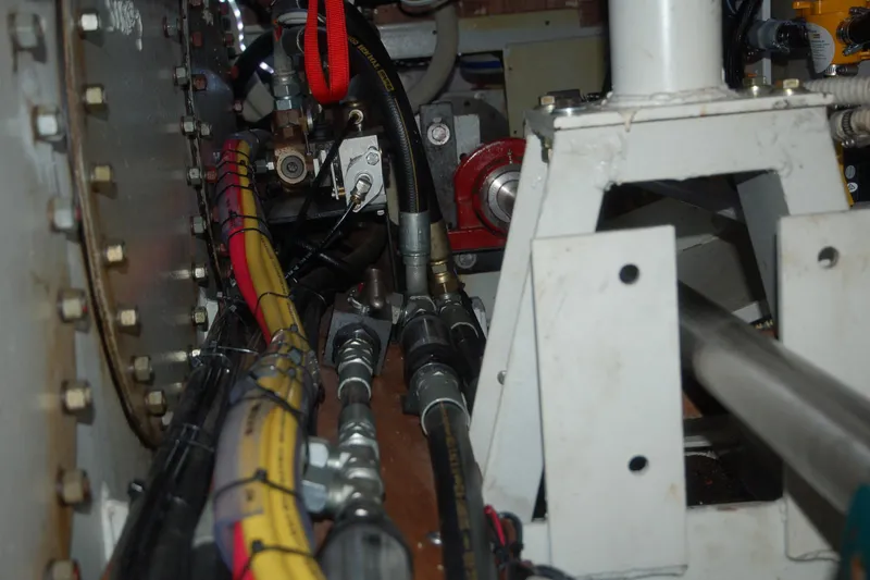 Slide: The Image of Interior view of a 2006 Custom Sprague machinery with cables and metal components. - 79
