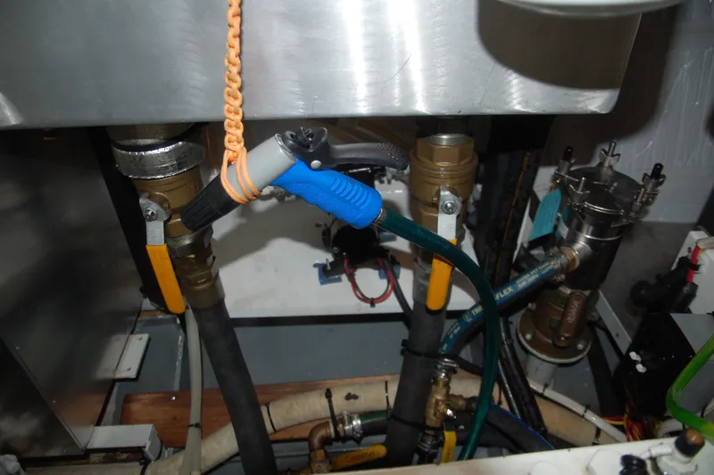Slide: The Image of Engine room plumbing with hoses and valves, Custom Sprague model, 2006. - 84
