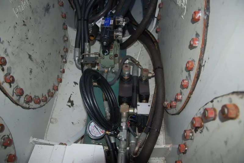 Slide: The Image of Interior view of a 2006 Custom Sprague machine with cables and gauges. - 88