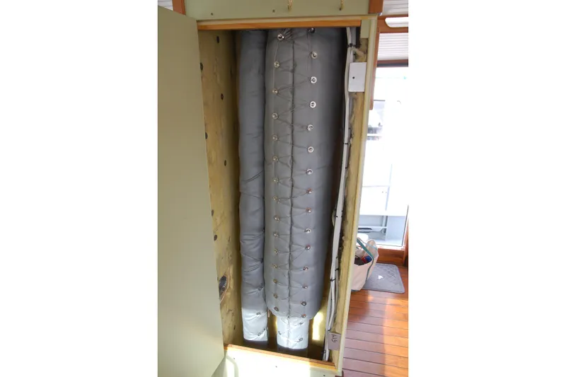 Slide: The Image of Insulated pipes in a wooden enclosure, Custom Sprague model, 2006. - 92