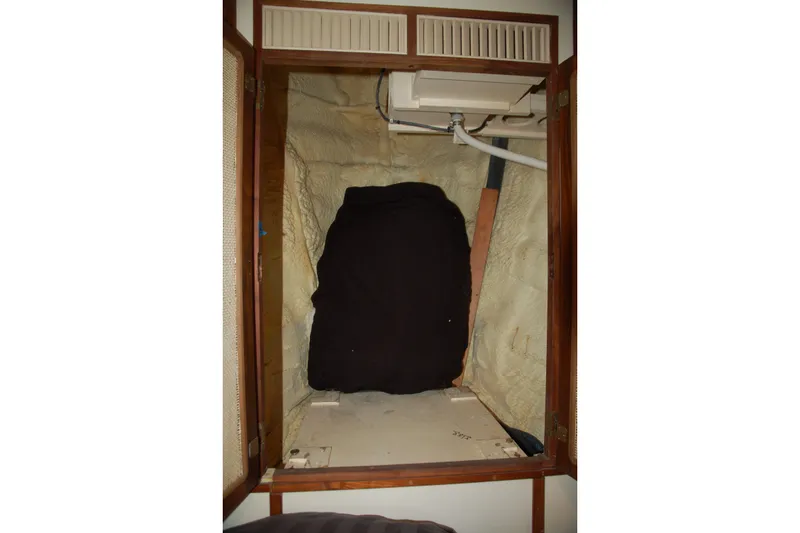 Slide: The Image of Custom 2006 Sprague interior with insulation and exposed pipes. - 96