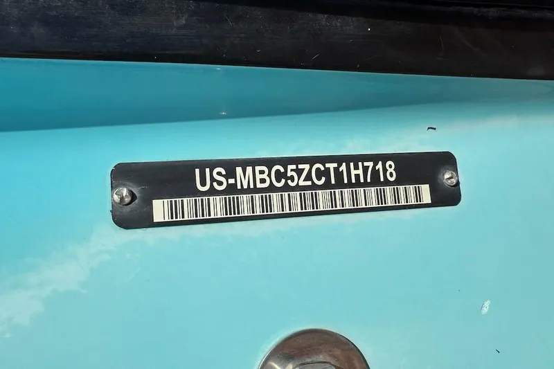 Slide: The Image of 2018 MasterCraft NXT22 boat hull identification number plate. - 22