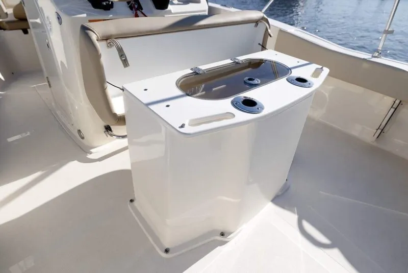 Slide: The Image of Manufacturer Provided Image: 2025 Scout 195 Sportfish boat, sleek white deck, modern design. - 7