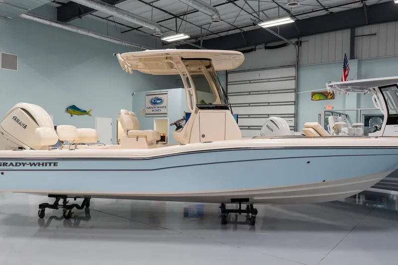 Slide: The Image of 2025 Grady-White 251 Coastal Explorer boat in showroom with Yamaha engine. - 0