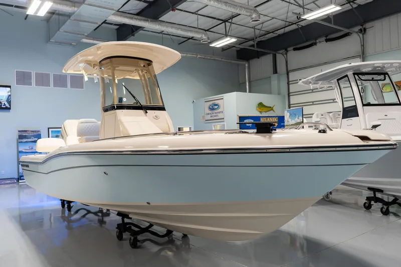 Slide: The Image of 2025 Grady-White 251 Coastal Explorer boat in showroom, side view. - 1