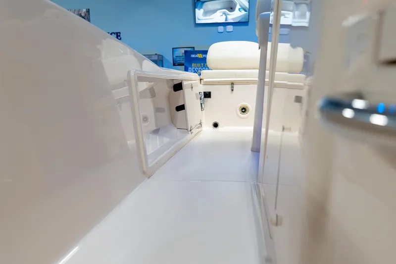 Slide: The Image of 2025 Grady-White 251 Coastal Explorer interior, showcasing sleek design and storage compartments. - 28