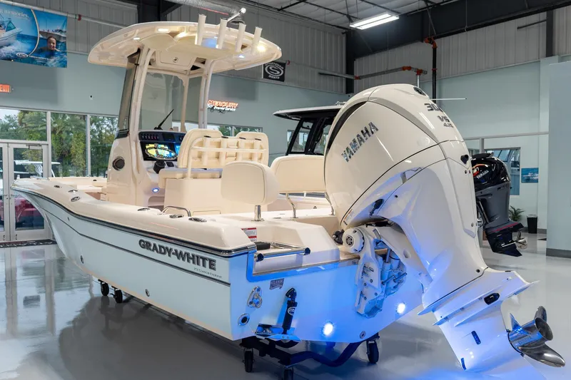 Slide: The Image of 2025 Grady-White 251 Coastal Explorer boat in showroom with Yamaha engine. - 3