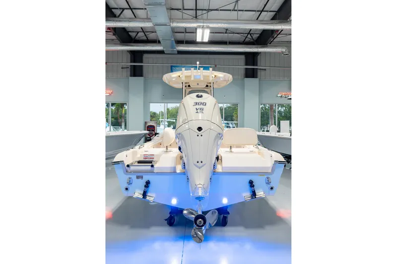 Slide: The Image of 2025 Grady-White 251 Coastal Explorer boat in showroom with Yamaha 300 engine. - 4