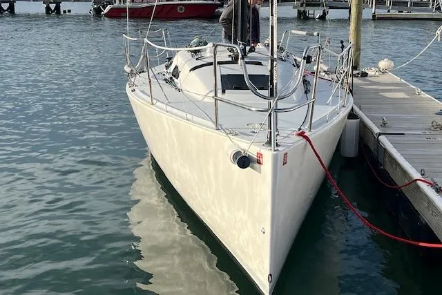 Slide: The Image of 2017 J Boats J/88 sailboat docked in marina, front view. - 10