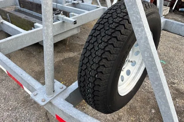 Slide: The Image of Trailer tire on a metal frame for 2017 J Boats J/88. - 35