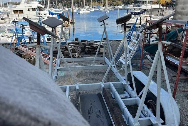 Slide: The Image of Boat cradle at marina with J Boats J/88, 2017 model, in the background. - 37